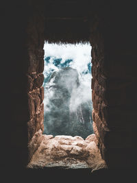 View of cave through window