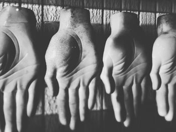 Close-up of hand hanging