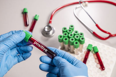 High angle view of human hand on table