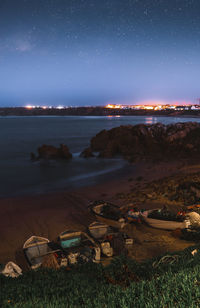 Scenic view of sea against sky at night