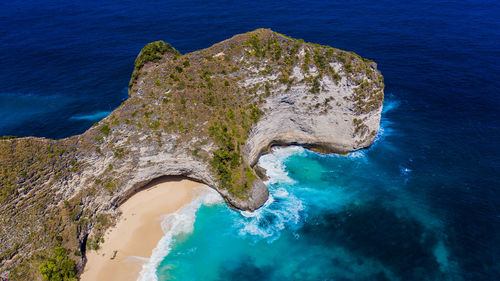 Aerial view of cliff by sea