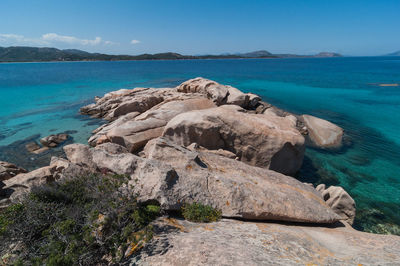 Scenic view of sea against blue sky