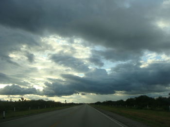 Road against cloudy sky