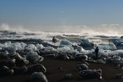 Scenic view of sea shore against sky