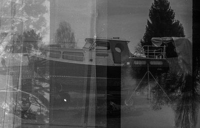 Reflection of building on glass window