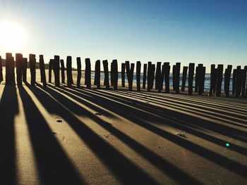 Surface level of row against sky on sunny day