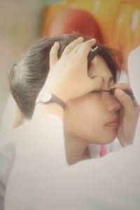 Close-up portrait of young woman