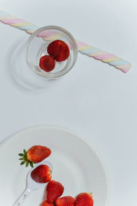 Close-up of strawberries in plate on table