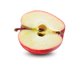 Close-up of apple against white background