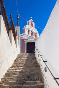 Bell tower of the catholic monastery of dominican nuns at fira city in santorini