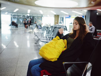 Group of people sitting at airport