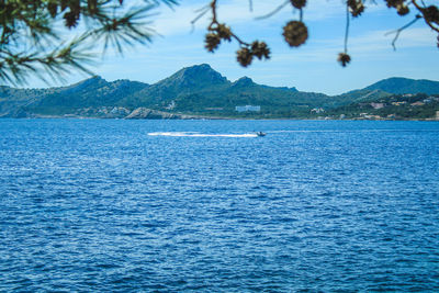 Scenic view of sea against blue sky