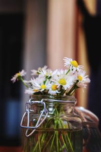 Close-up of flower vase on table