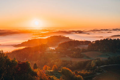 Scenic view of mountains against sky during sunset