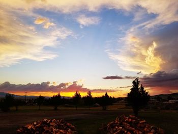 Scenic view of sunset over land