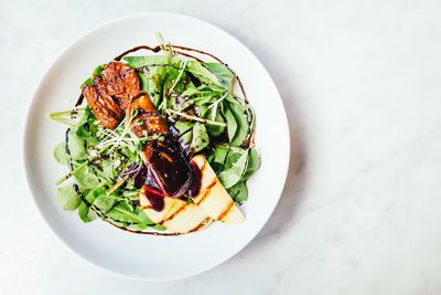 High angle view of salad in bowl on table