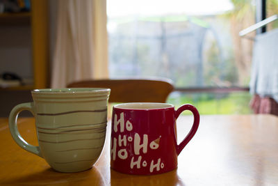 Close-up of coffee cup on table