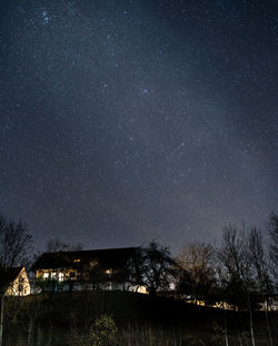 Scenic view of star field against sky at night