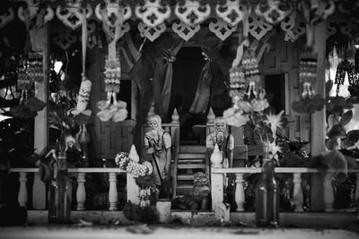 Statue outside temple against building