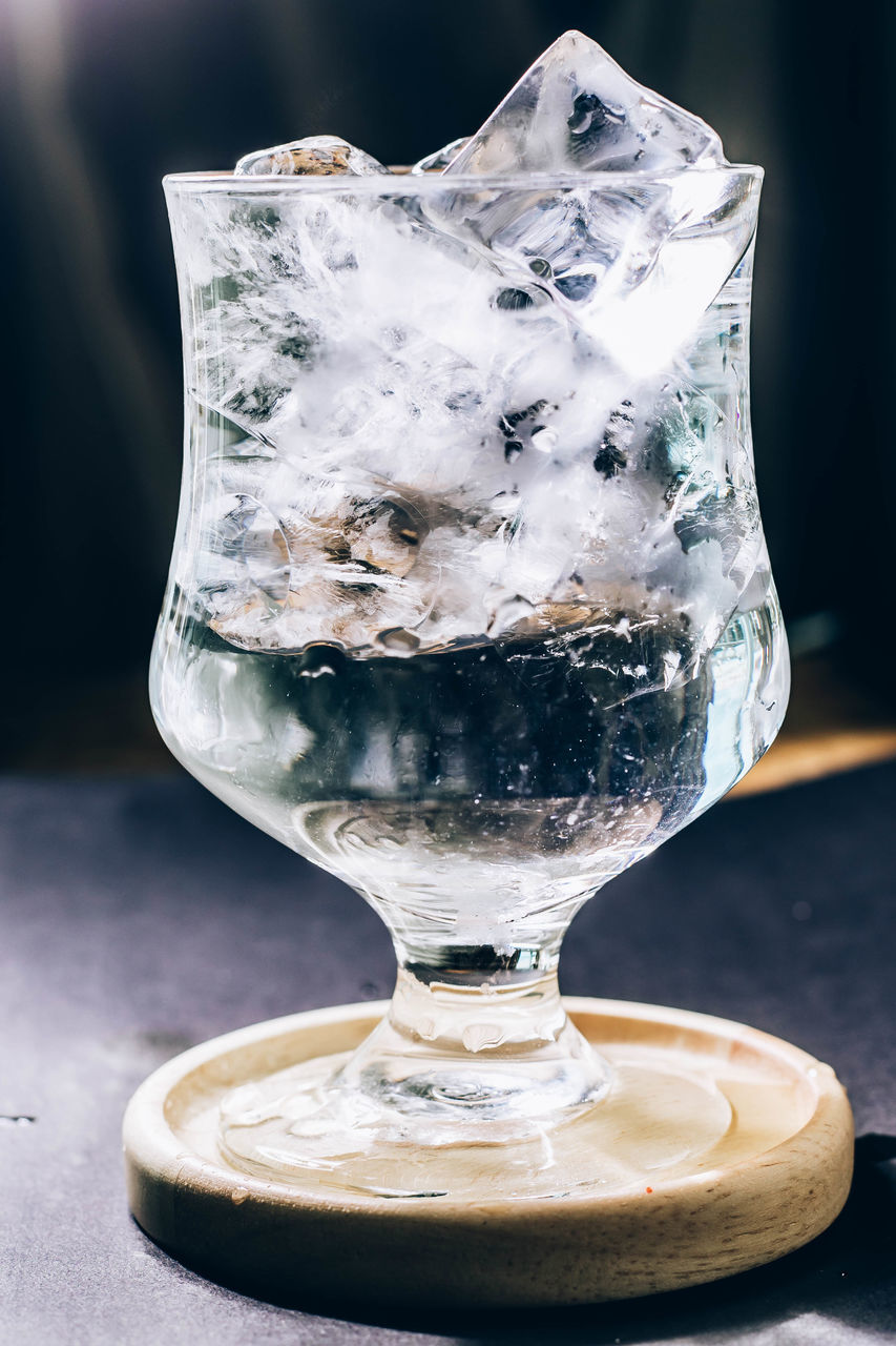 refreshment, drink, cold temperature, food and drink, glass, frozen, distilled beverage, drinking glass, alcoholic beverage, no people, household equipment, indoors, close-up, alcohol, ice cube, studio shot, ice, still life, single object