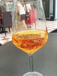 Close-up of beer glass on table