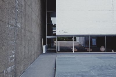 Reflection of building on glass window