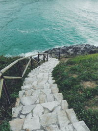 High angle view of staircase amidst sea