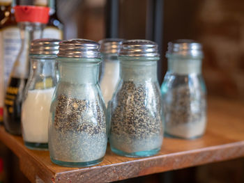 Close-up of glass jar on table