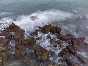 Scenic view of rocks in sea