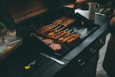 Close-up of meat on barbecue grill