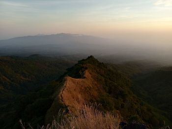 High angle view of mountains against sky during sunset