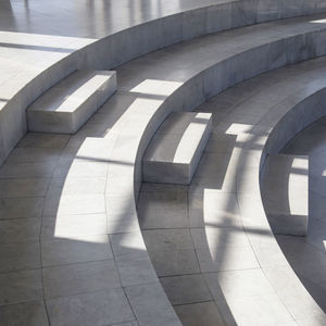 Shadows in a bright interior with marble walls on a bright sunny day. 