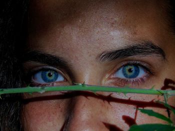 Close-up portrait of girl with blue eyes