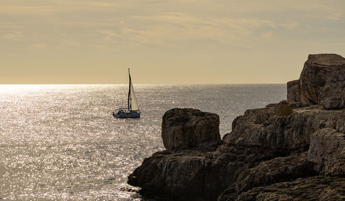 Scenic view of sea against sky during sunset