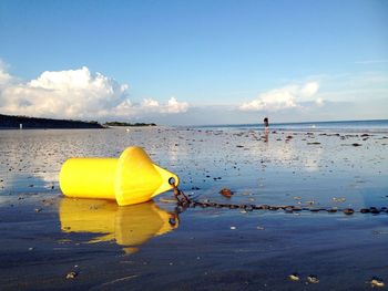 Surface level of yellow float on shore