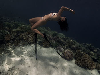 Side view of woman on beach