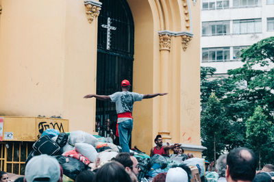 Group of people in front of building