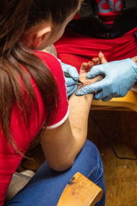 High angle view of girl drawing on table