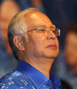 Close-up portrait of man wearing eyeglasses