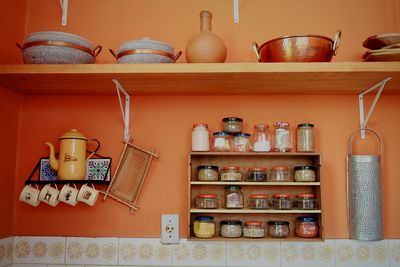 Various utensils arranged on shelves