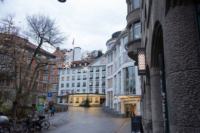 People walking on street in city