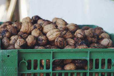 Close-up of walnuts in crate