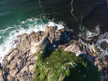 High angle view of rocks on shore