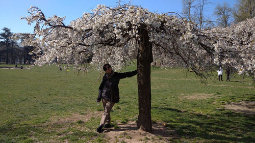 Full length of woman standing on field