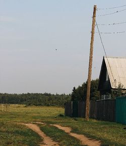 Built structure on field against clear sky