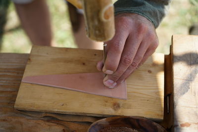 Cropped image of carpenter using hand tool