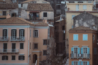 Houses in town against sky