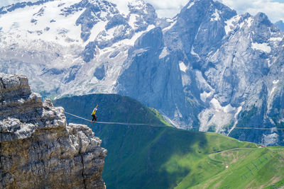 Man performing stunt on the line