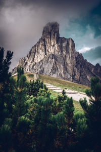 Bad weather at giau pass big cloud on ra gusela peak, dolomites unesco