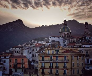 High angle view of town against sky during sunset